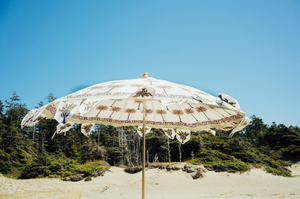Hand block palm printed fabric parasol in pink.